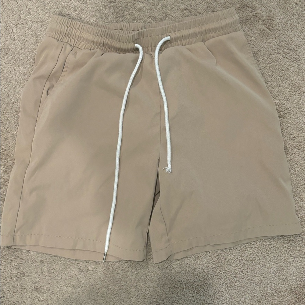 Beige men’s short shorts
